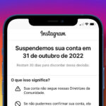 Mensagem de Instagram suspenso na tela do celular